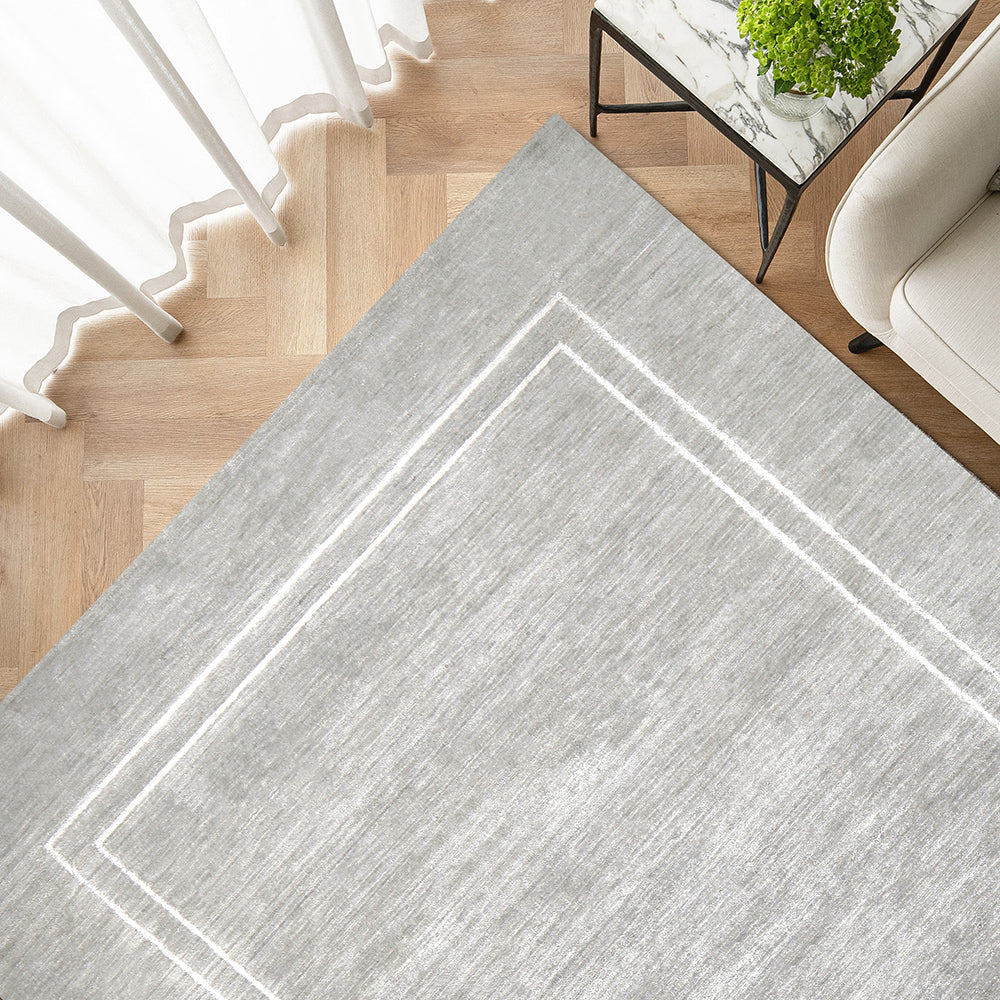 Colin Alba - White Bordered Grey Carpet | Carpet Centre