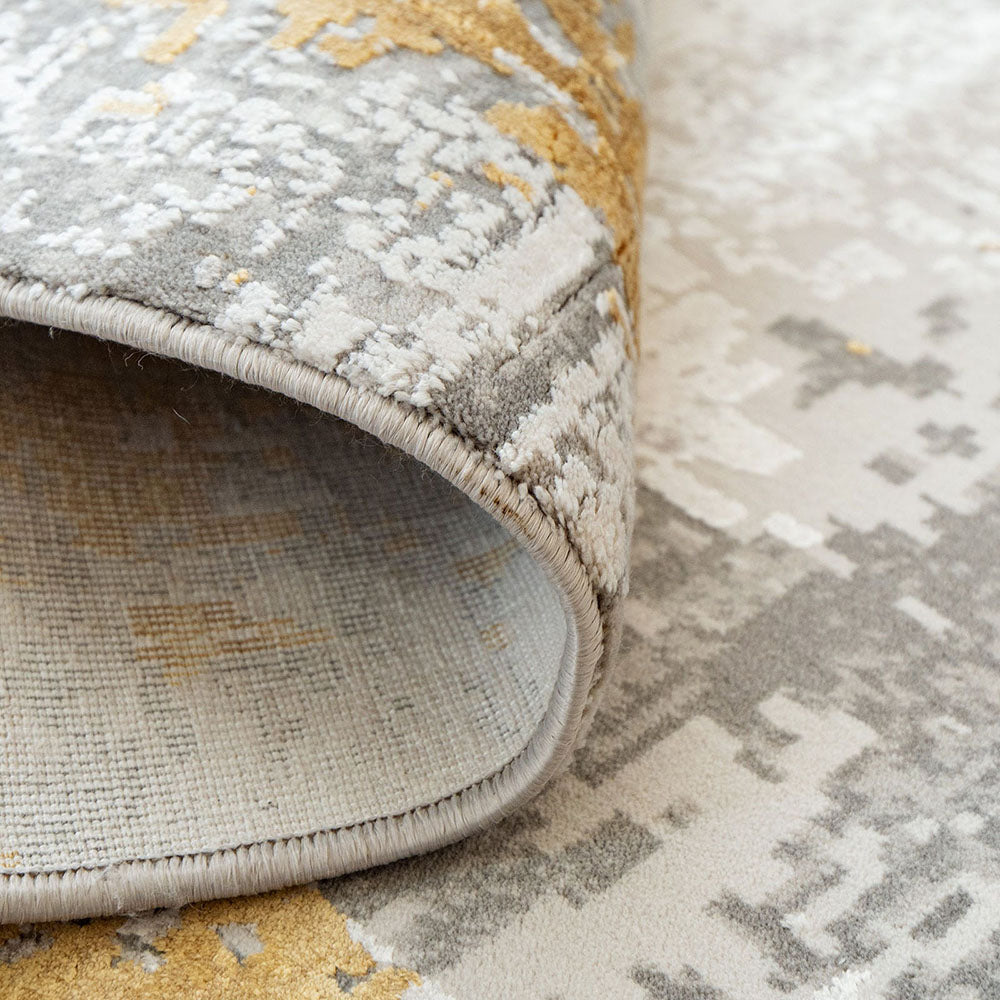 Ashton Goldberg - Faded Abstract Carpet In Shades Of Grey with Golden Yellow | Carpet Centre